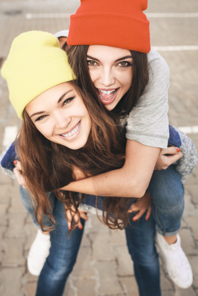 Two young  hipster girl friends