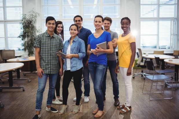 Group of business executives smiling at camera